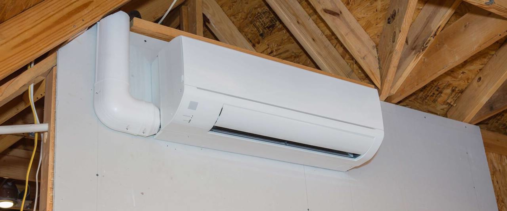 Does a ductless air conditioner need to be on an outside wall?
